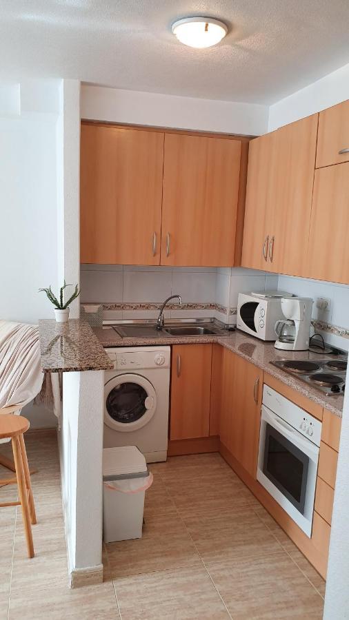 Apartment In Campoamor Overlooking The Swimming Pool Ngoại thất bức ảnh